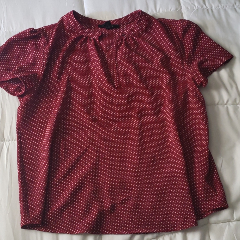 Red polka-dot blouse